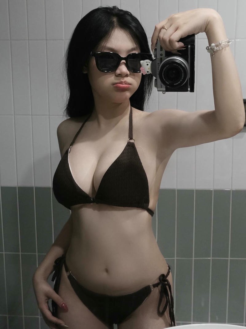 gái xinh đeo kính râm