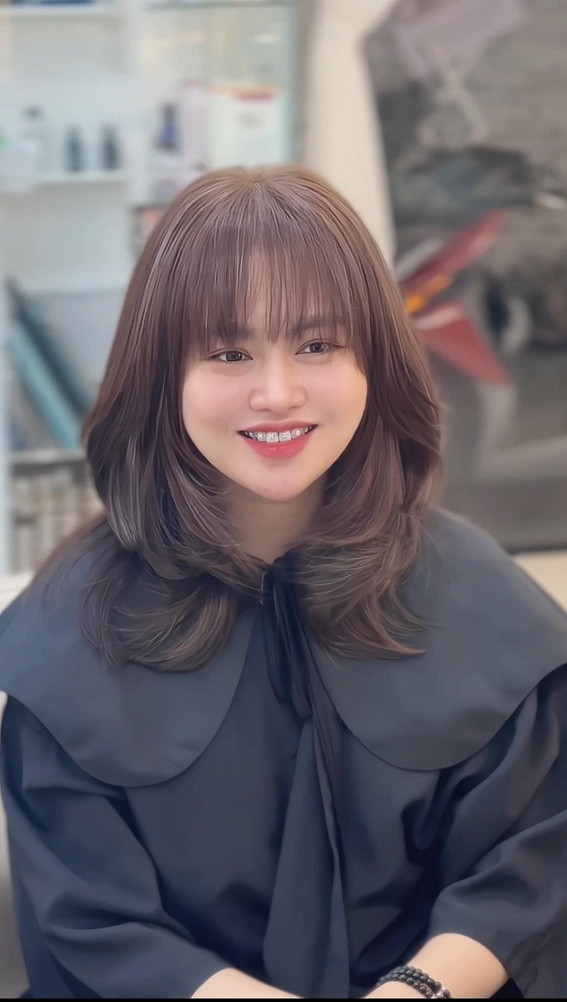 tóc layer ngang vai uốn cụp