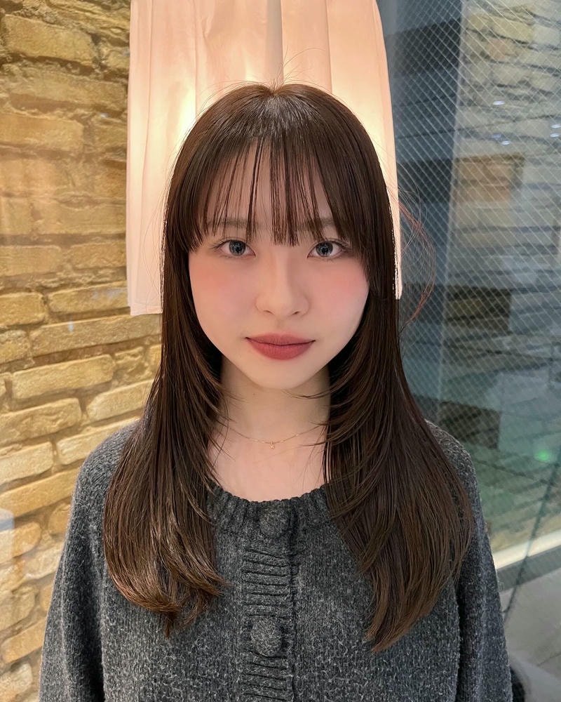 tóc layer nữ mặt tròn có mái bay