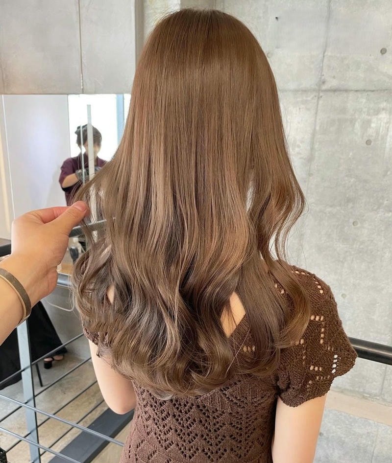 tóc ngang vai uốn lơi