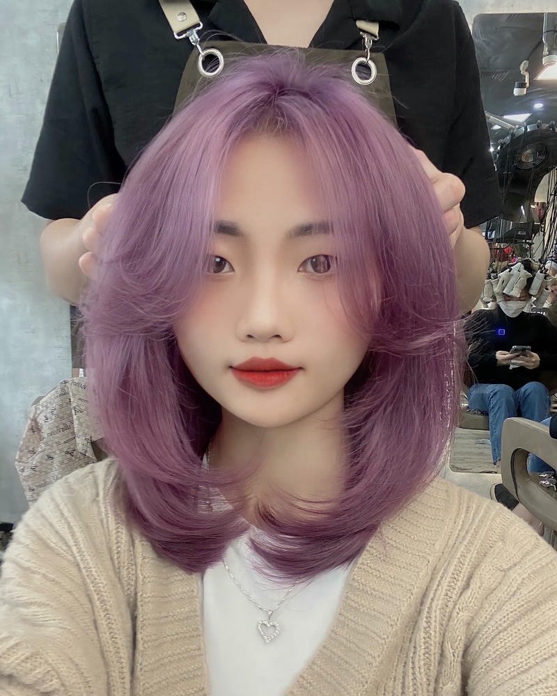 tóc xoăn sóng lơi ngang vai