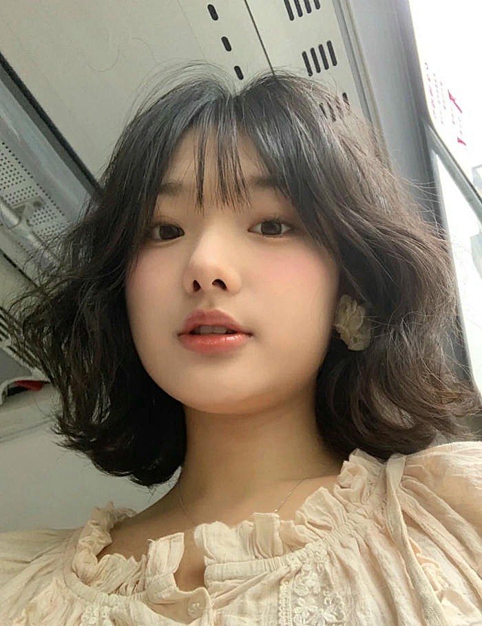 tóc xoăn lơi ngắn