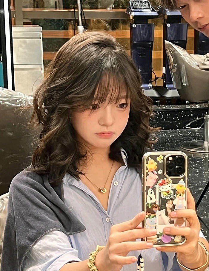 tóc xoăn sóng lơi ngang vai